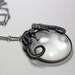 ariel. conjoined seahorse spyglass necklace.