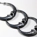 new moon. triple owl talon crescent necklace.