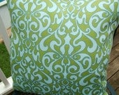 Outdoor throw pillow in green and blue