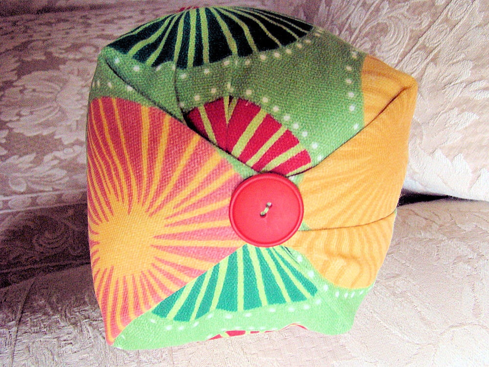 Indoor Outdoor Pillow roll, green and multicolored pinwheels