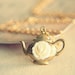 Alice's Wedding. A Fairytale rose and teapot necklace. ONLY 1 LEFT.