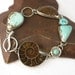 Ammonite Fossil Koroit Boulder Opal and Turquoise Cabochon Multi Stone Linked Bracelet