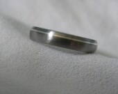 Ring or Non Traditional Wedding band Titanium with narrow offset Silver Pinstripe