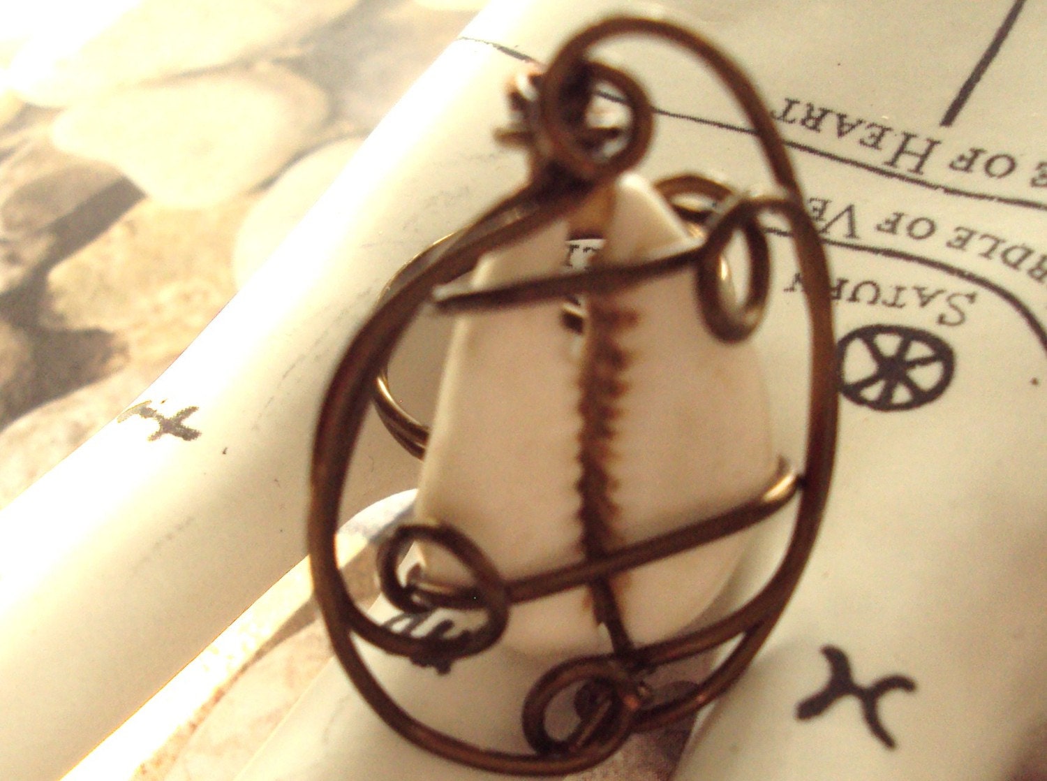 Wire Wrapped Cowrie Shell Ring Size 6 in Antiqued Copper Wire