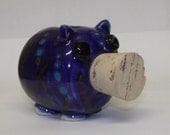 Medium sized blue piggy bank with flowers