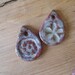 2 small clay pendants
