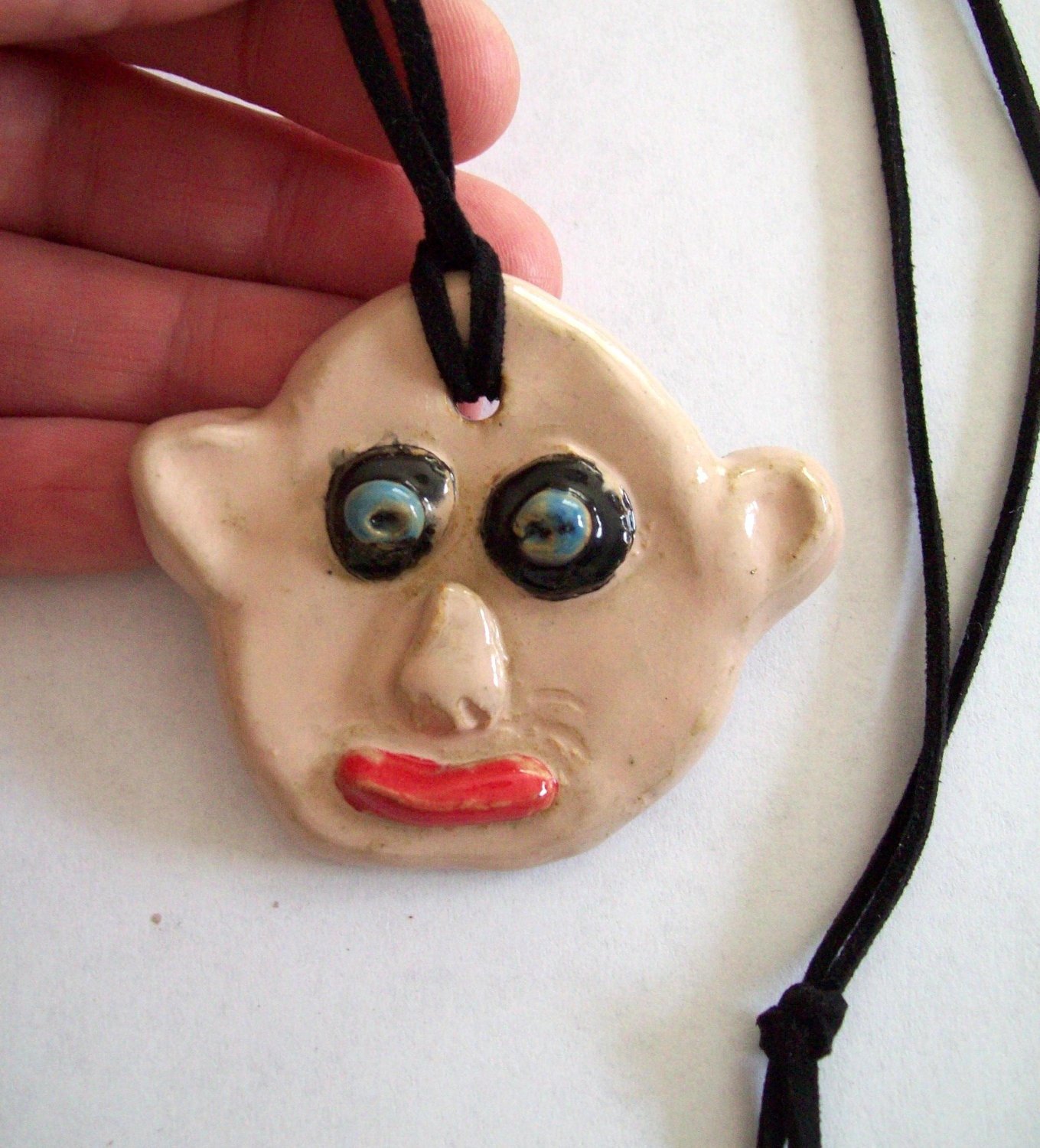 Ceramic Pendant ODD quirky happy silly boy on suede cord