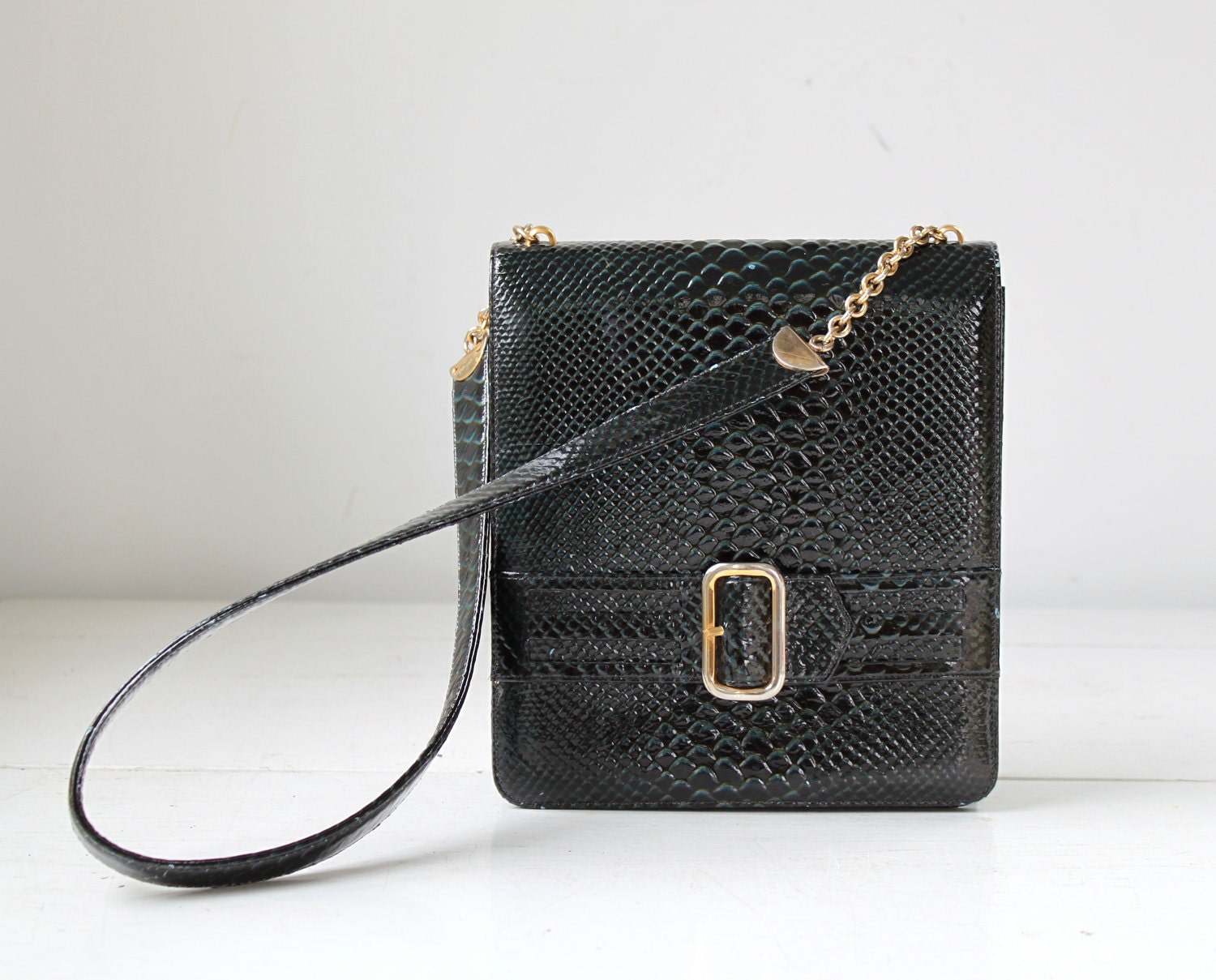 vintage 1960s mod handbag. Dark teal, lizard patent. Belt accent. Beinen Davis / the RUM BABA shoulder bag