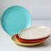 vintage 1950s melamine cake plates. Set of 4. Aqua, scarlet, tan, mustard. Florence Prolon retro mod melamine / the CRAZY CAKE plates