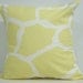 New 18x18 inch Designer Handmade Pillow Case. Giraffe pattern in light yellow on white.