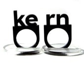 typographic kern acrylic ring set