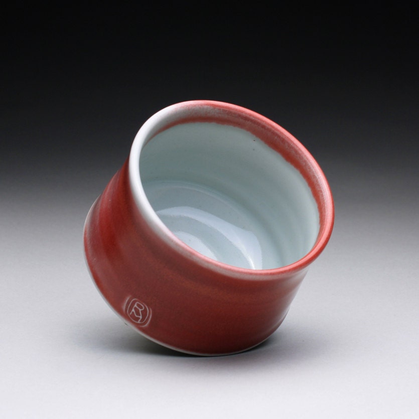 porcelain cup, chawan, tea bowl with bright red and turquoise celadon glazes