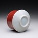 porcelain cup, chawan, tea bowl with bright red and turquoise celadon glazes