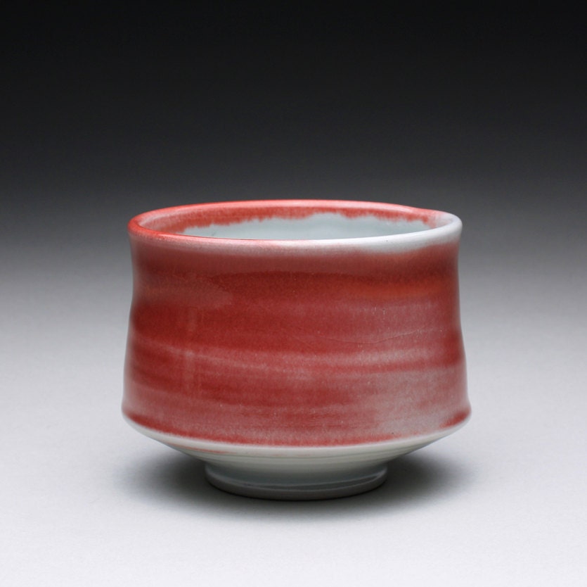 porcelain cup, chawan, tea bowl with bright red and turquoise celadon glazes