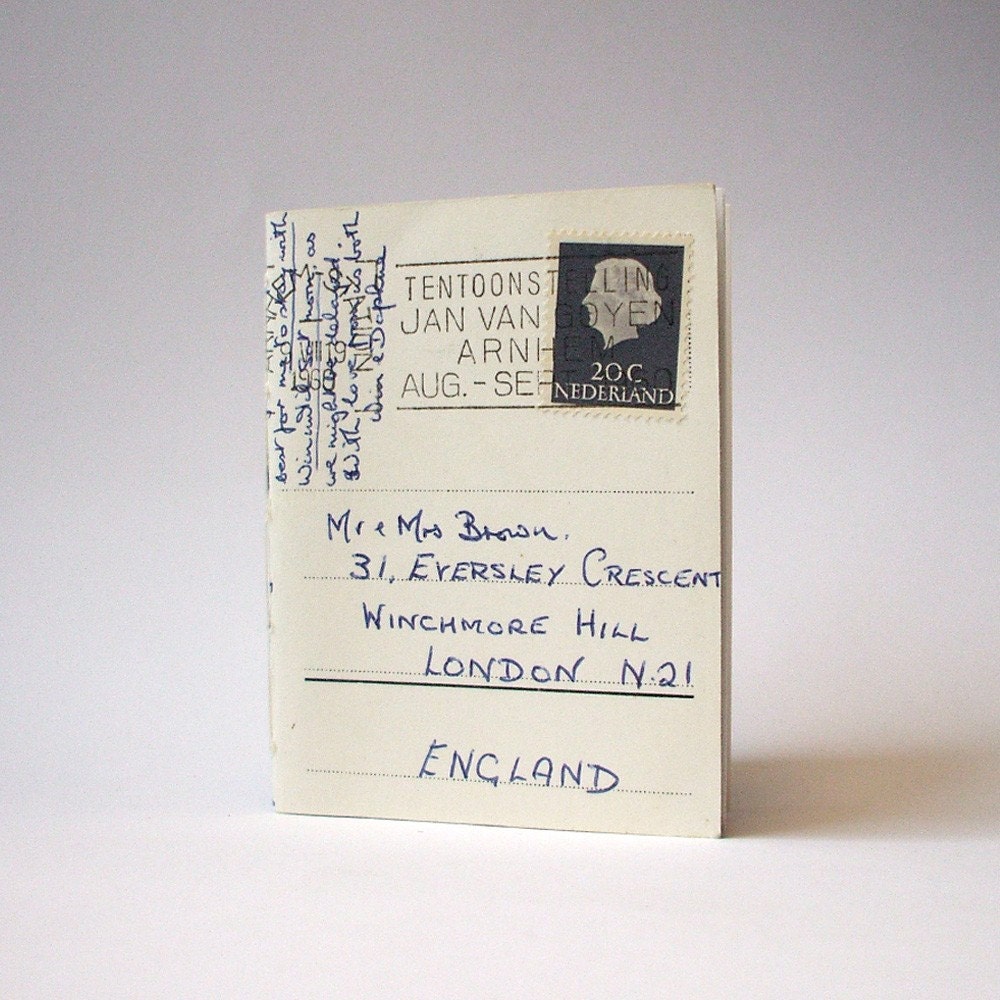 Notebook bound in vintage postcard