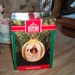 1990 Hallmark Keepsake Glass Ornament with Box and Price Tag Norman Rockwell Art The Saturday Evening Post