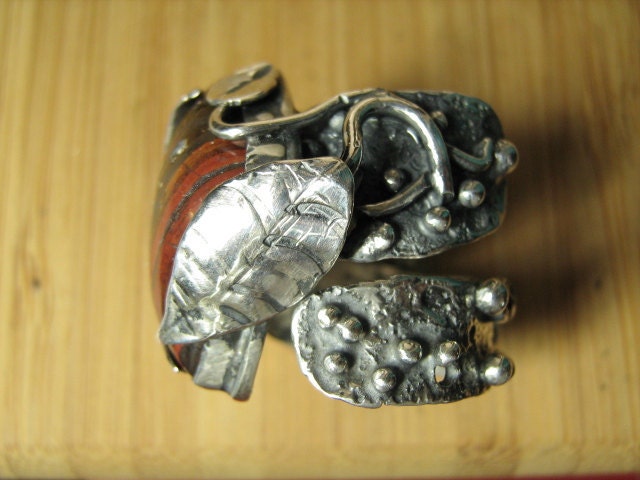 Out of hardship Tiger Iron Adjustable Ring