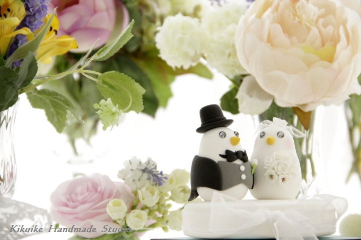 birds with swallow-tailed coat, tuxedo wedding cake topper