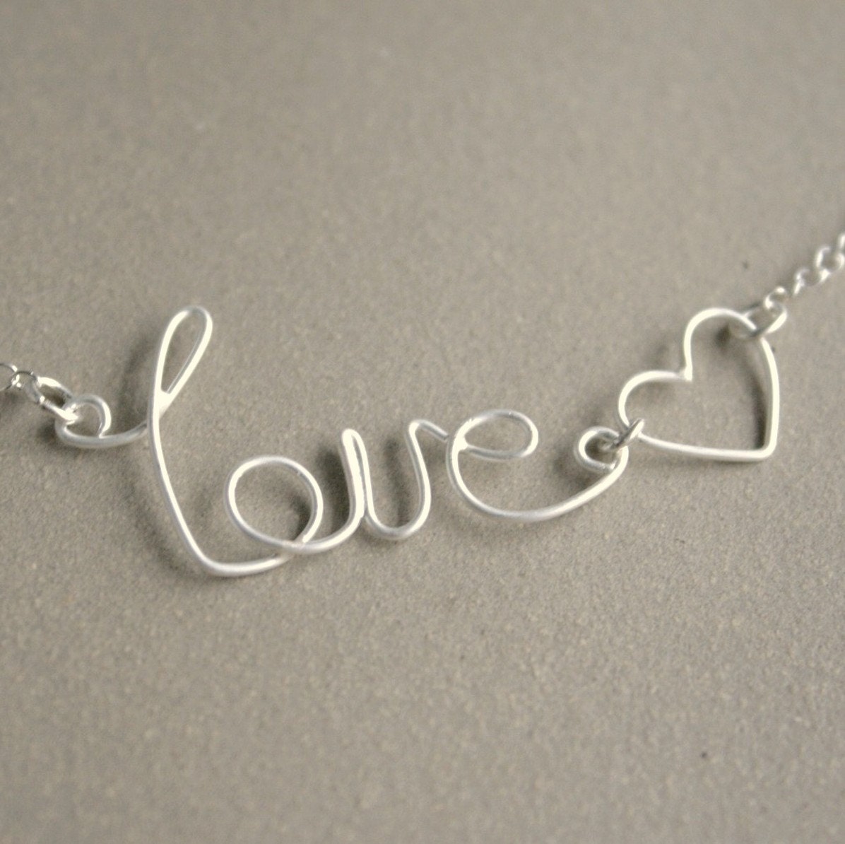 love necklace with heart. Love is a Word. sterling silver wire word with heart.