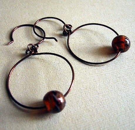 Copper hoop earrings with burnt orange art glass bead