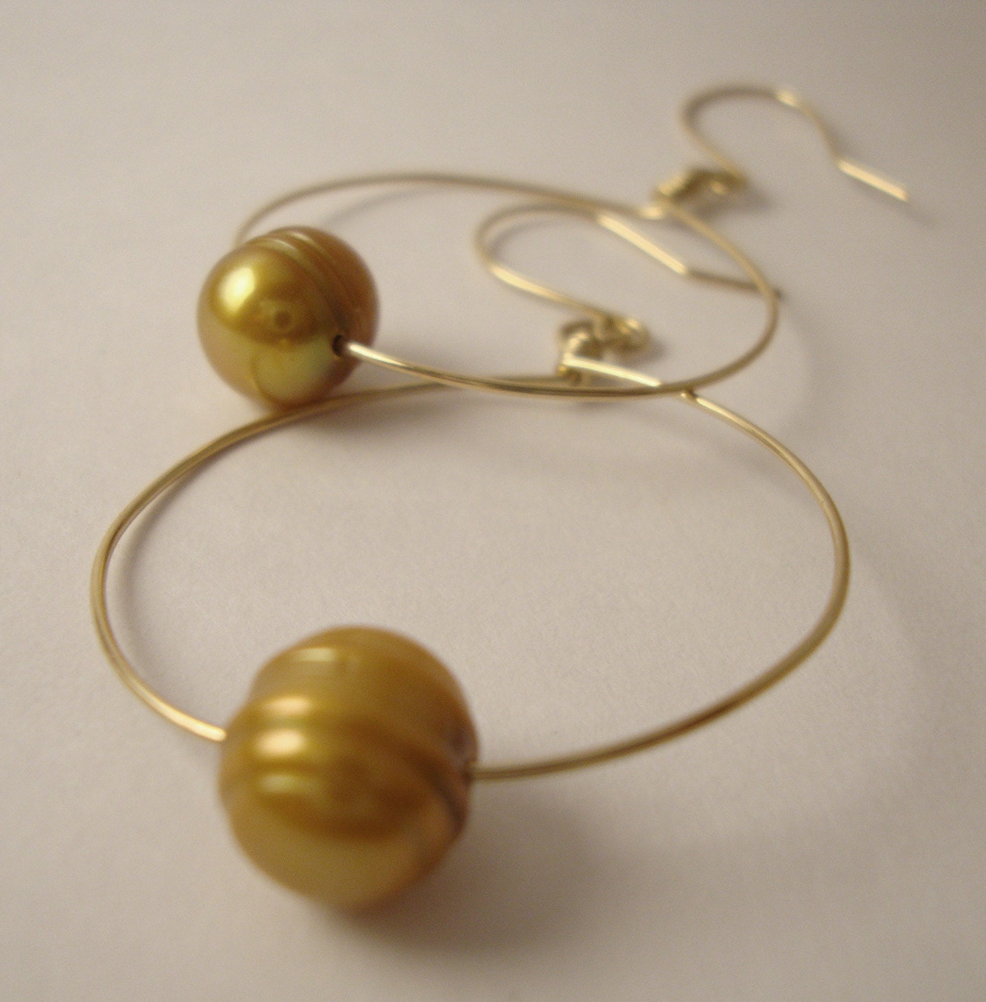 Gold pearl drop hoop earrings