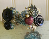 Handmade Bracelet  Vintage Altered  Button Bracelet Filigree Bracelet Vintage Ornate Charm Bracelet Cuff Bracelet
