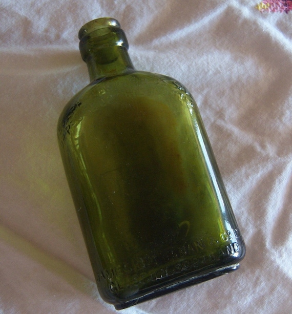 Download Green Glass Whiskey Flask Bottle Vintage with by ... Yellowimages Mockups