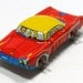 60s tin toy CAR, red with blue & yellow, from Japan.