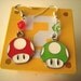 1-UP Mario Nintendo Green Mushroom Geektastic Swarovski Earrings