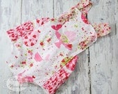 Baby Girl Ruffled Romper Sunsuit in Strawberry Soiree by Charming Necessities