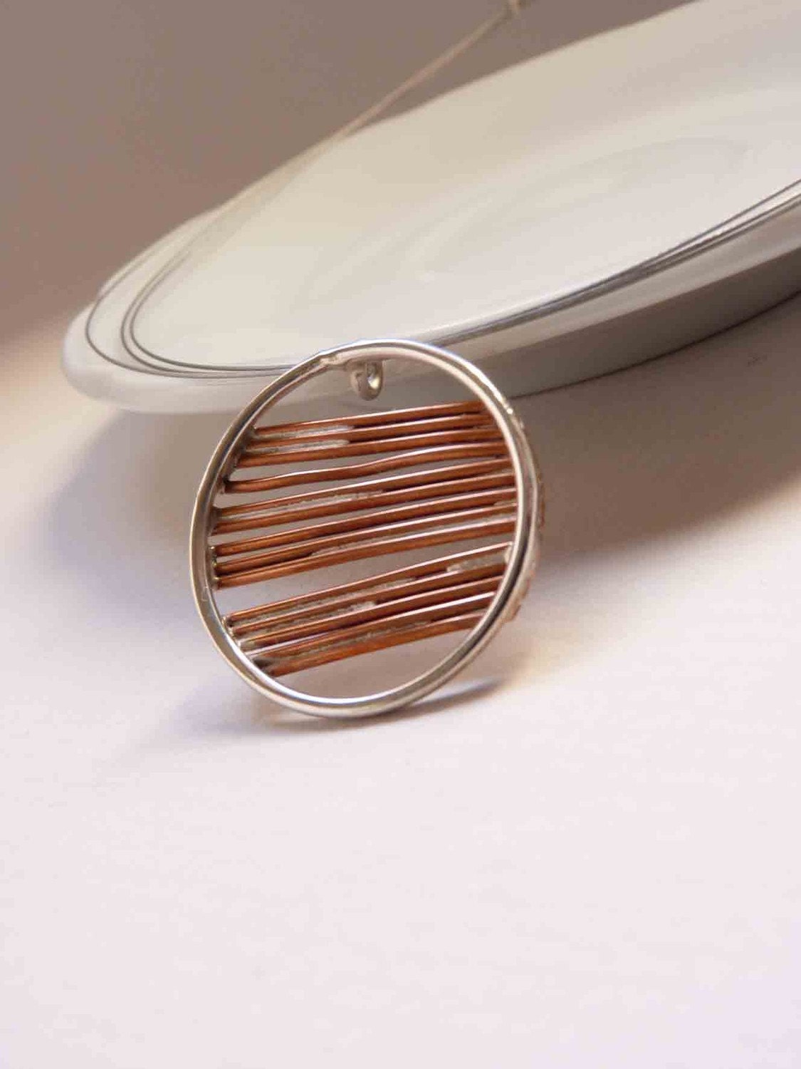 Necklace round of an inch, copper and sterling silver Asymmetrical sticks. Minimalist design, simple to use all day