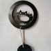 Recycled bike gear bottle opener
