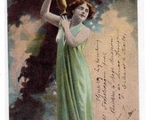 Red haired Lady in green dress with Trophy Vintage Postcard - undivided