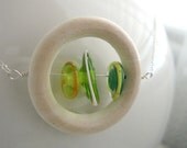 Green Glass Amoeba in a Wooden Circle Necklace