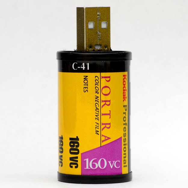 USB Flash Drive (8 GB) made w/ recycled 35mm film canister.