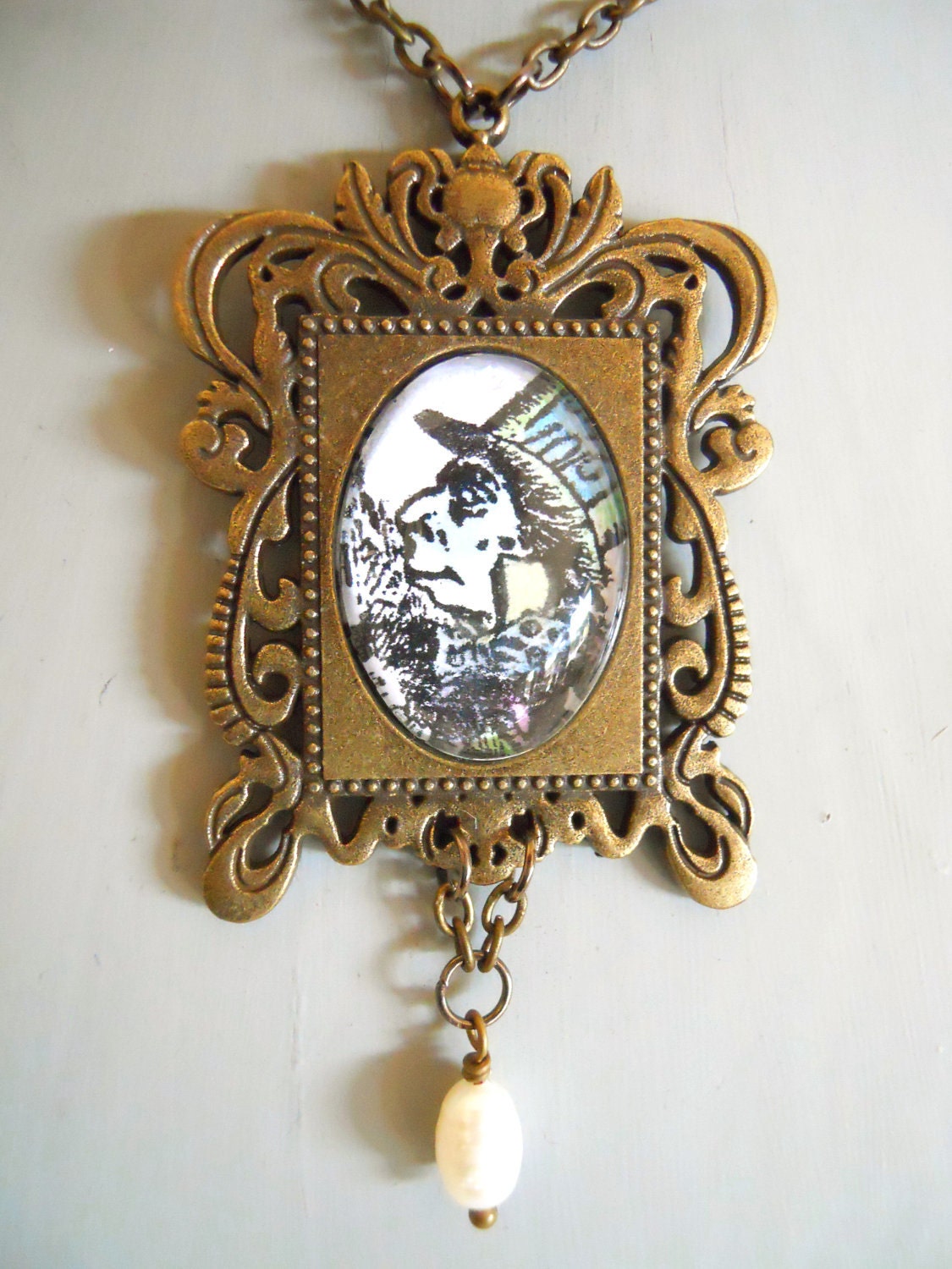 Mad Hatter Necklace Tea Party Jewelry Alice in Wonderland Character in an Ornate frame Setting with fresh water pearls