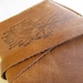 Leather journal or sketchbook featuring diagrammed bird with free personalization