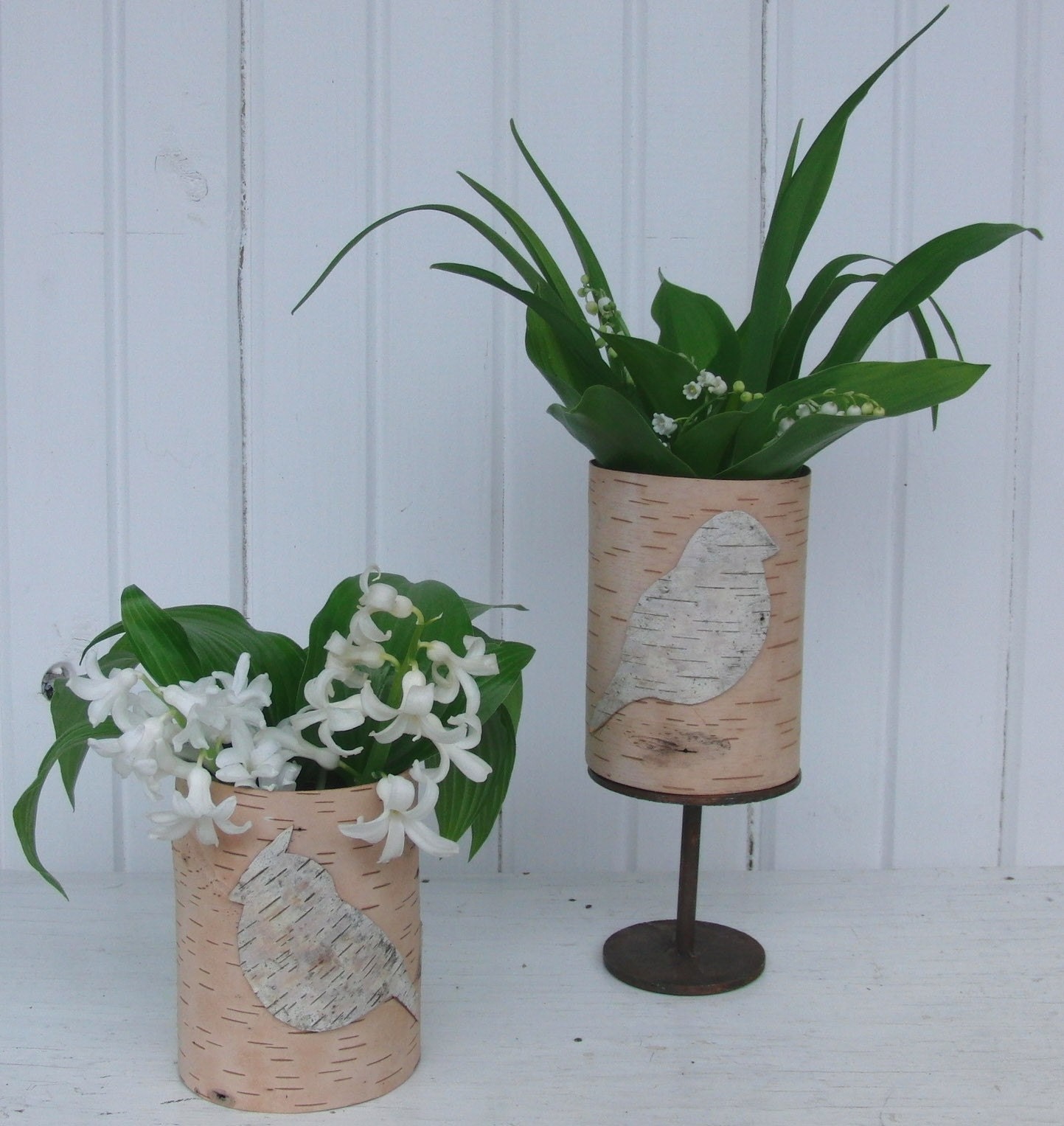 Birch bark vase with bird