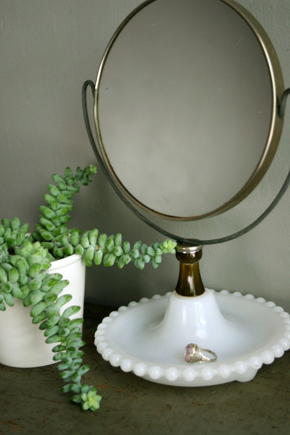 vintage milk glass mirror.