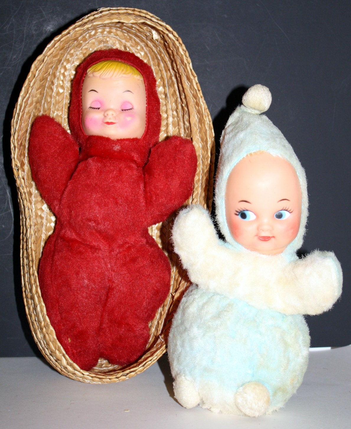 2 Vintage Snow Baby, Dolls from 1940s One moves & musical with straw bed and other googley ,side glance eyes,roly-poly style Snow babies