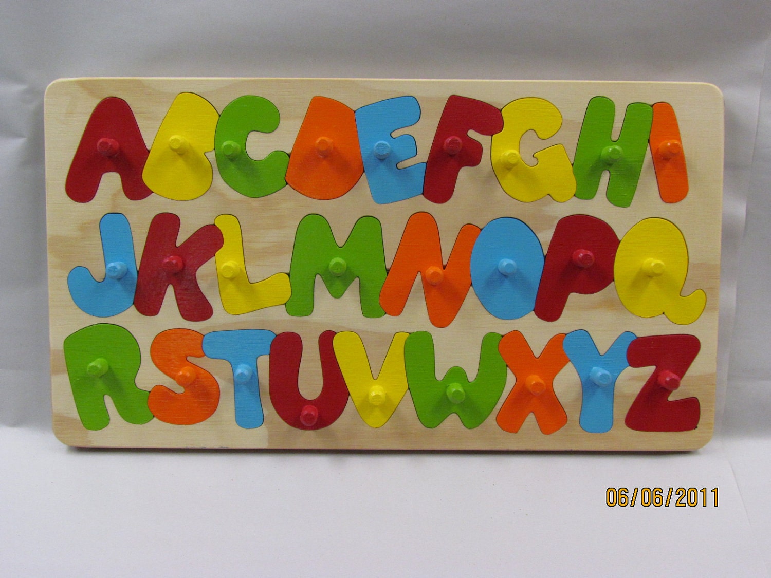Alphabet Puzzle wooden toy with with wood pegs