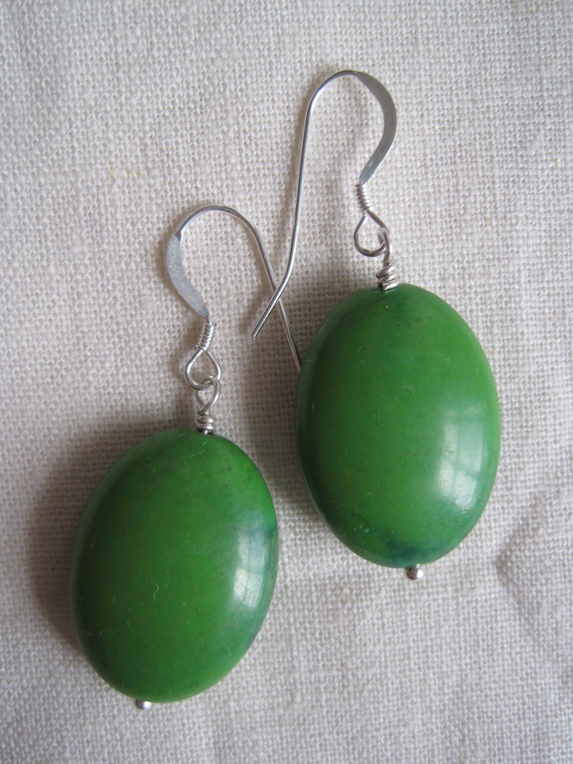 green oval earrings