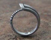 Ouroboros Ring, contemporary design, in textured, hammered and oxidized silver. Made to order, needs three weeks to complete