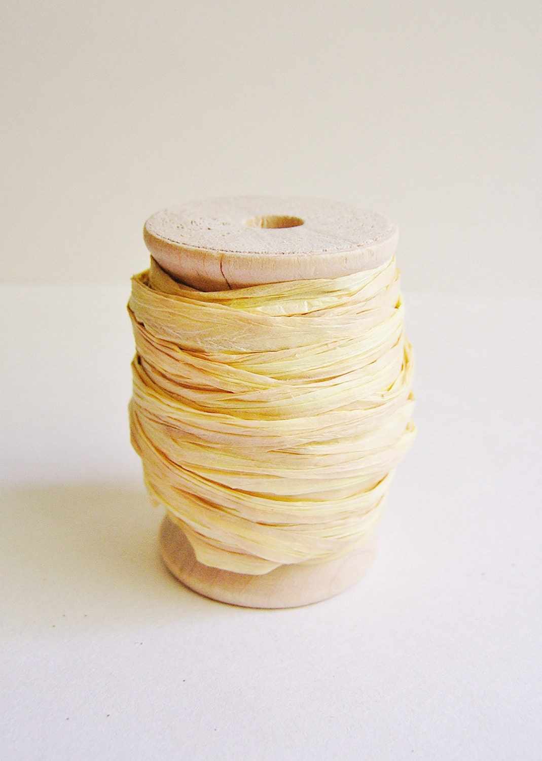 Ginger Ombre Paper ribbon on a wood Spool