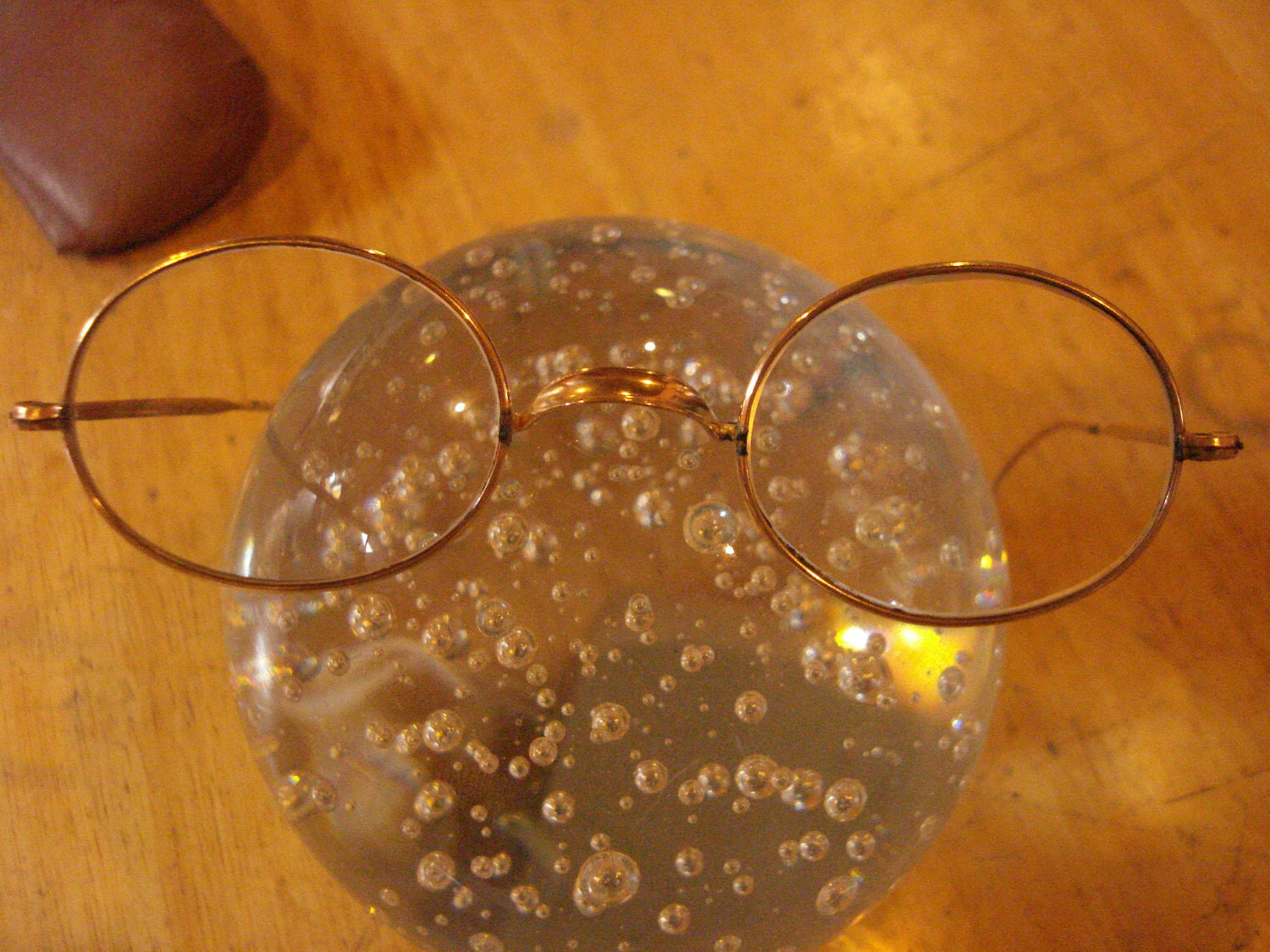 vintage pair of gold over brass oval wire rim glasses