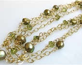 Gold necklace. Pearl necklace. Station necklace. Green pearls and crystals. OPERA