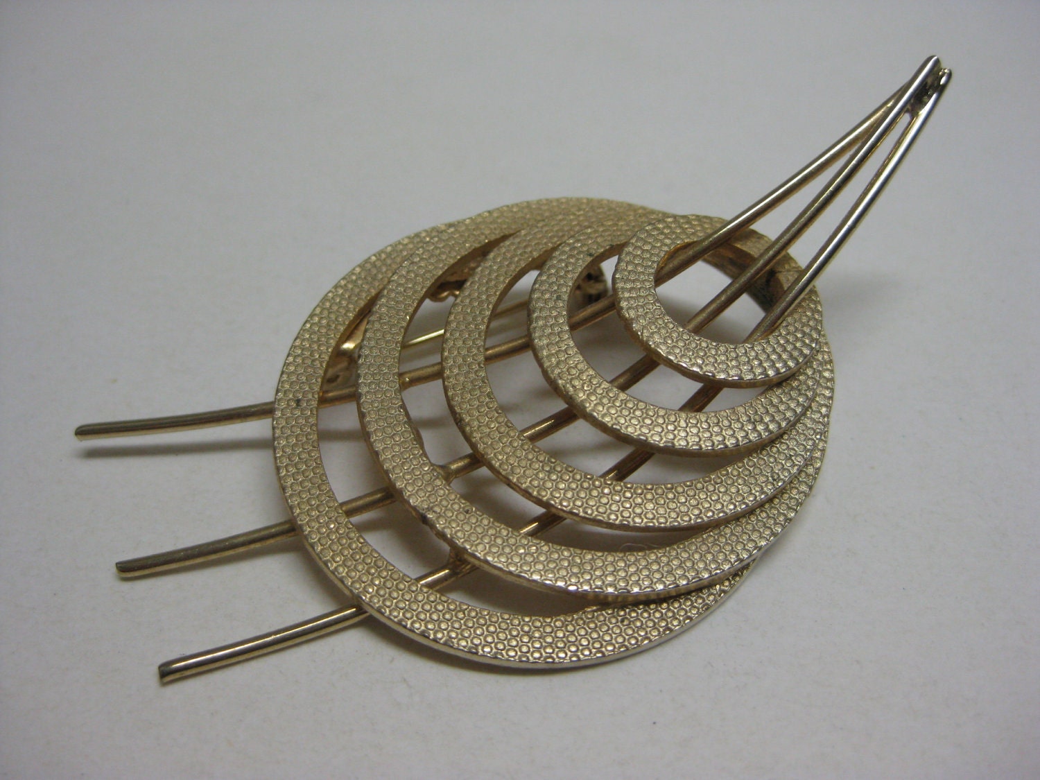 3 through 5 Golden Circles - vintage brooch