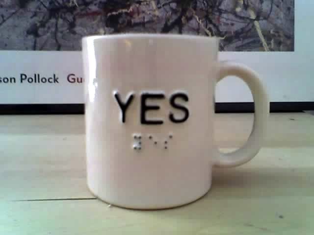 YES mug (Braille)