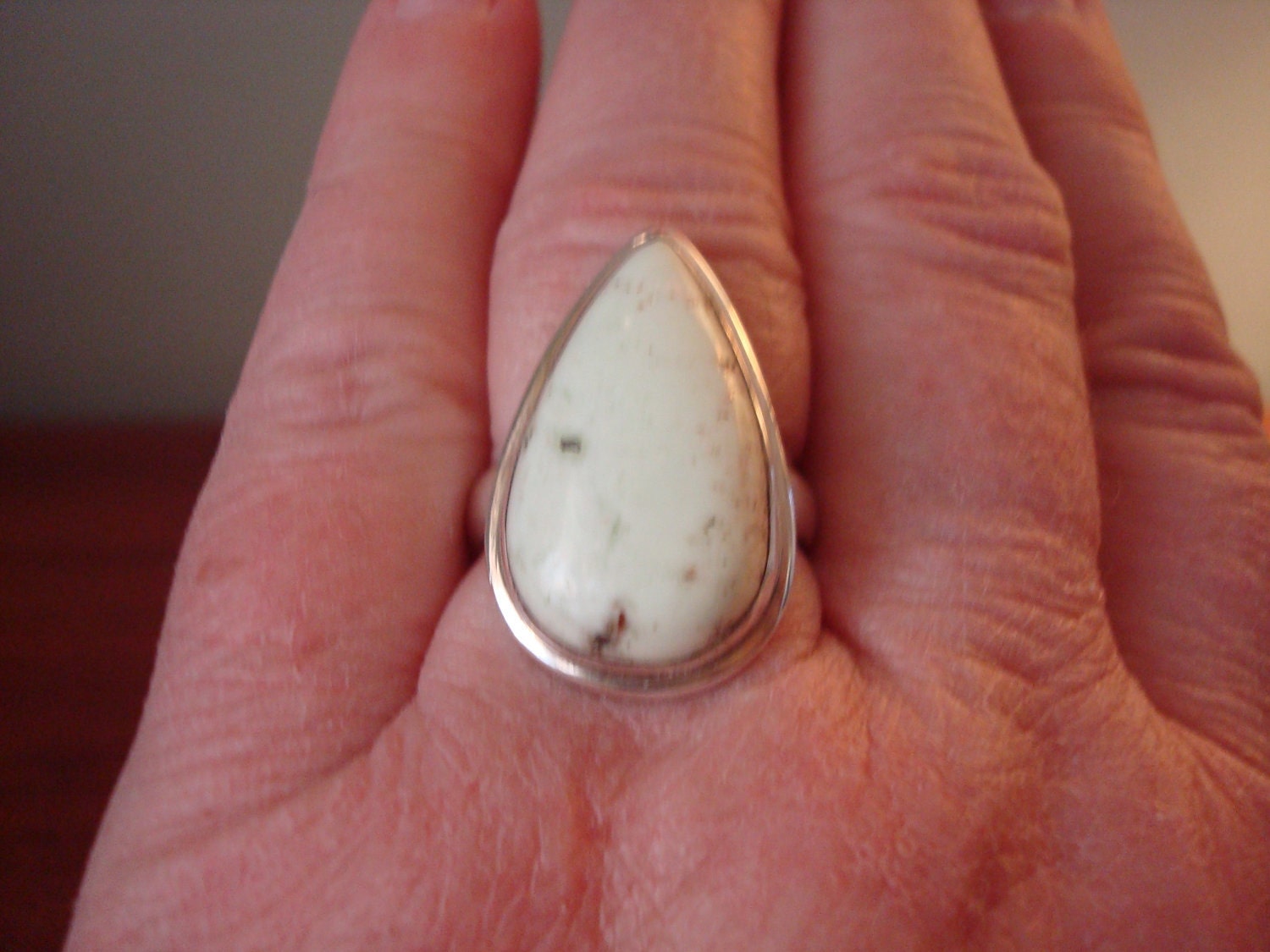 Sterling silver ring with white stone