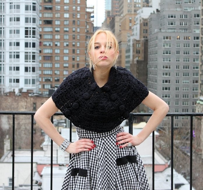 A Cosmopolitan Caper, Black Capelet